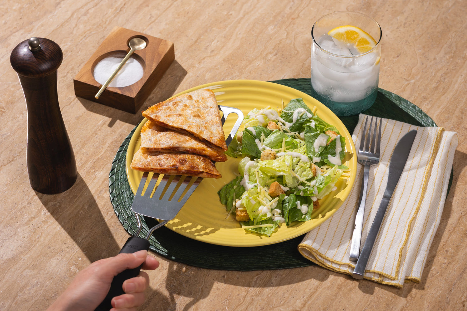 Crispy Rise & Puff quesadilla slices served with Caesar salad on a yellow plate for a fresh, balanced meal.