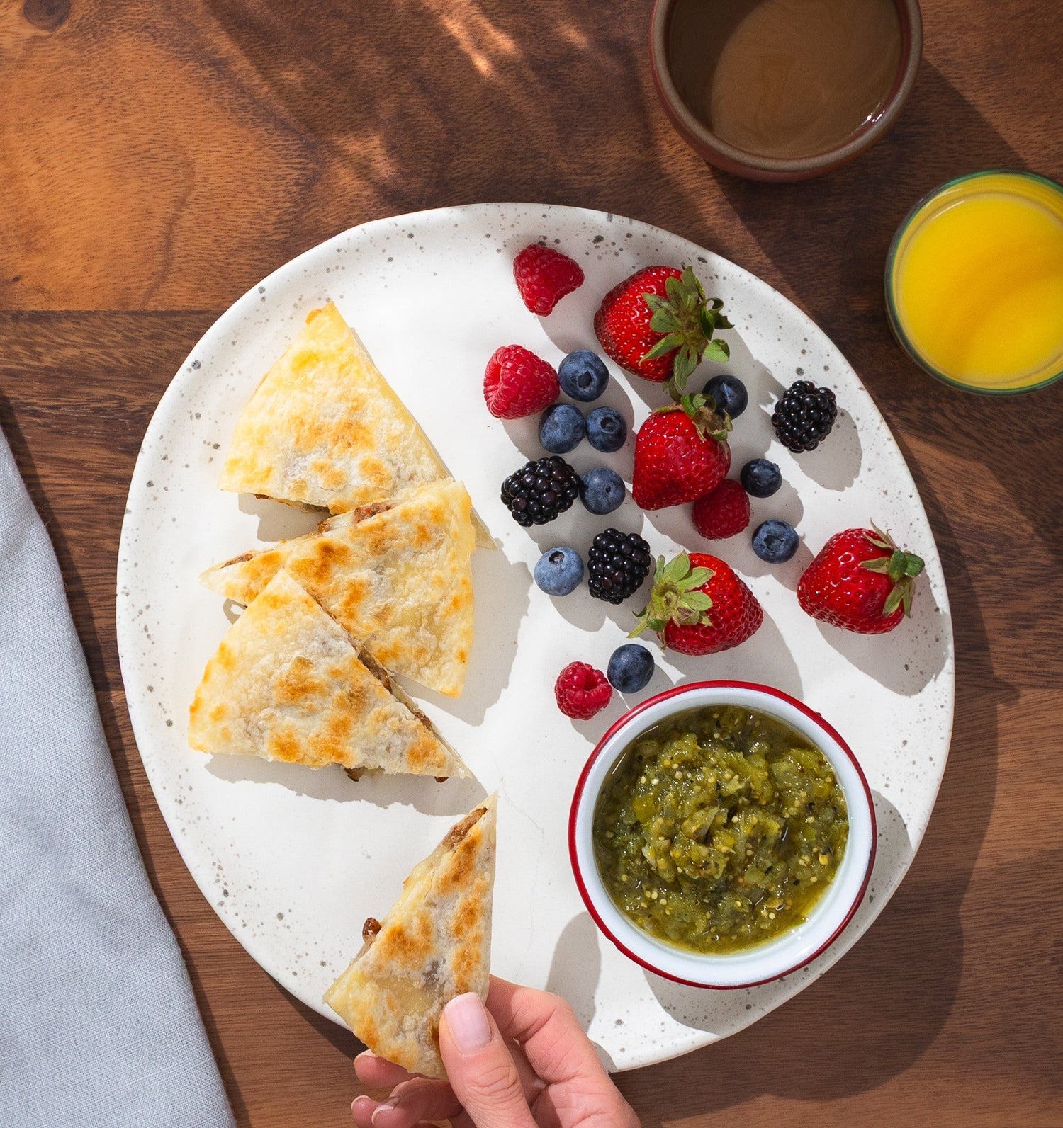 Rise & Puff’s quesadilla, served with berries, chocolate sauce, and cheese.