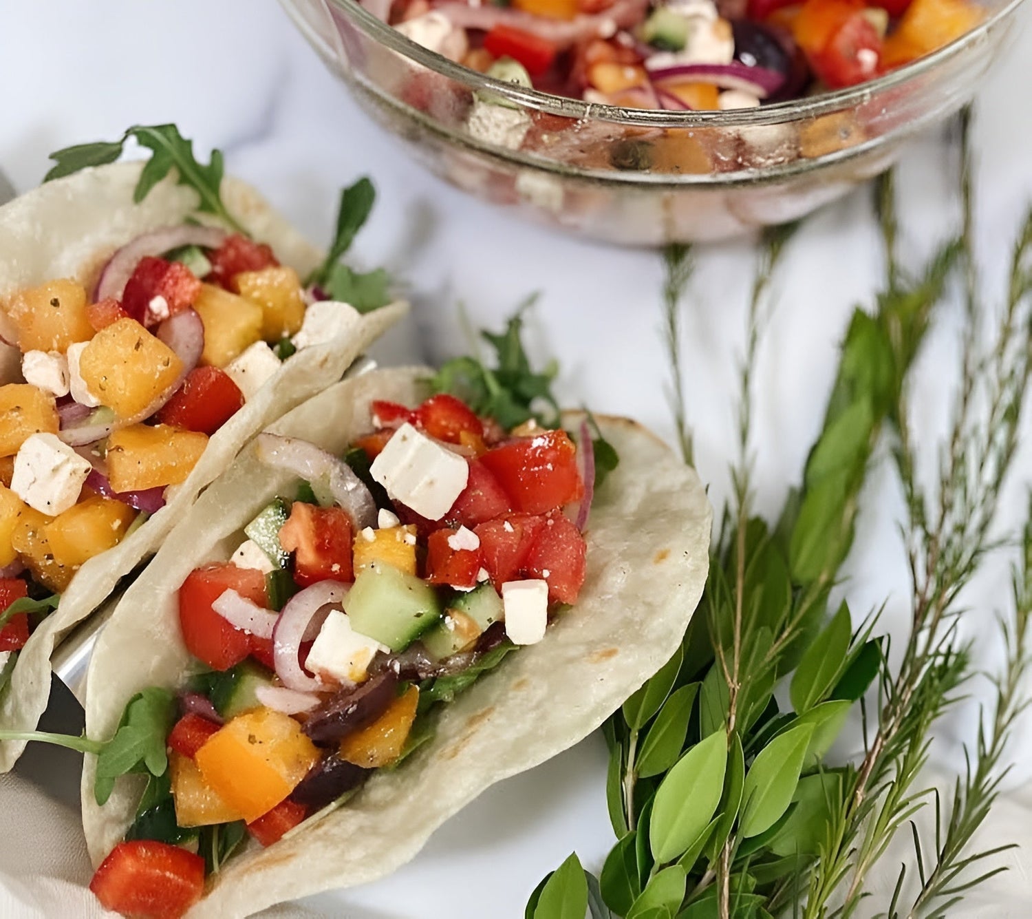 Fresh veggie tacos with colorful vegetables and herbs served in soft tortillas by Rise & Puff.