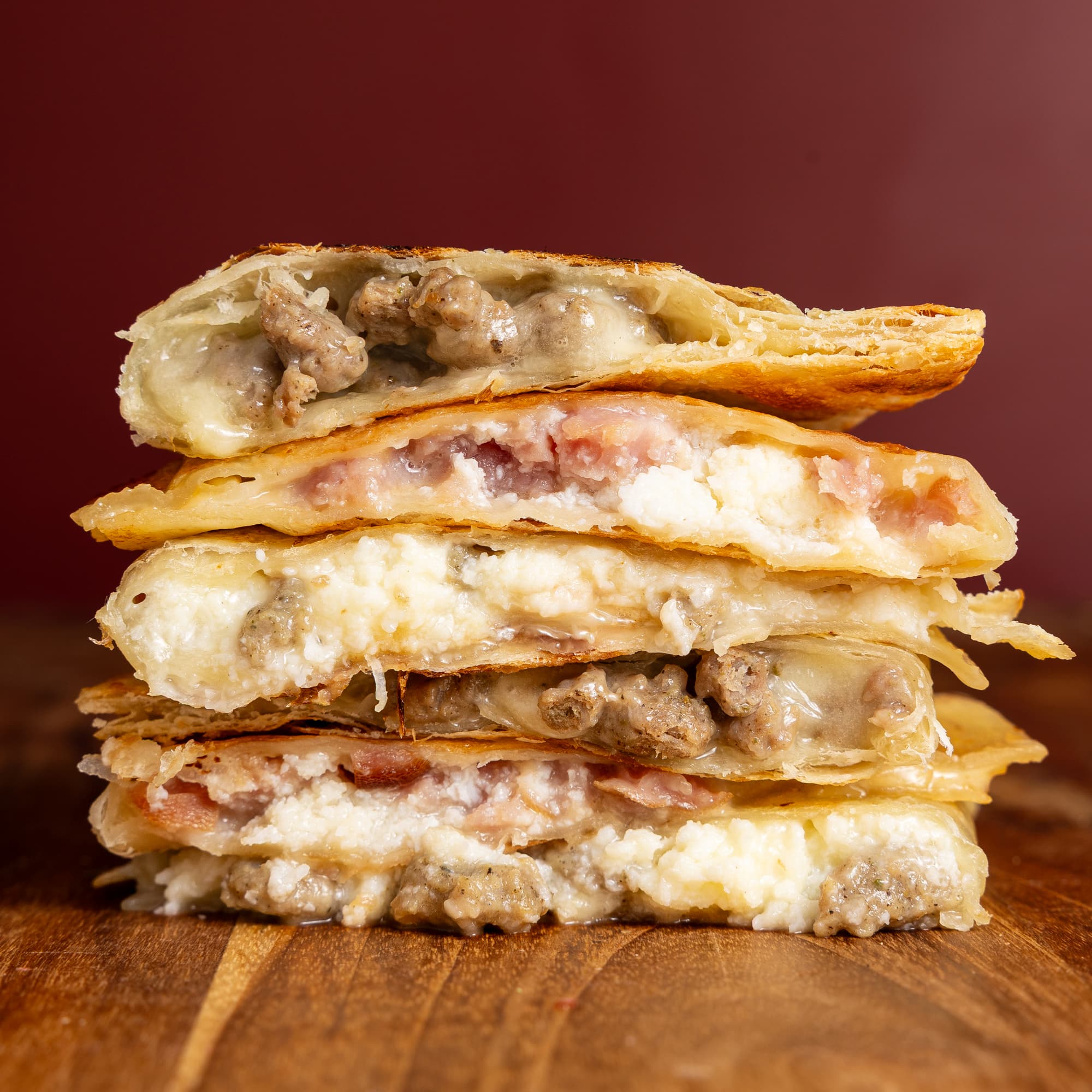 Rise & Puff breakfast quesadillas stacked on top of each other showing the clean and healthy ingredients
