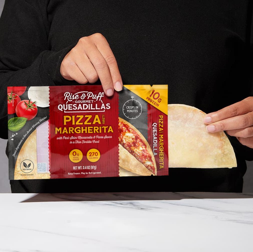 Margherita Pizza quesadilla being pulled out of packaging