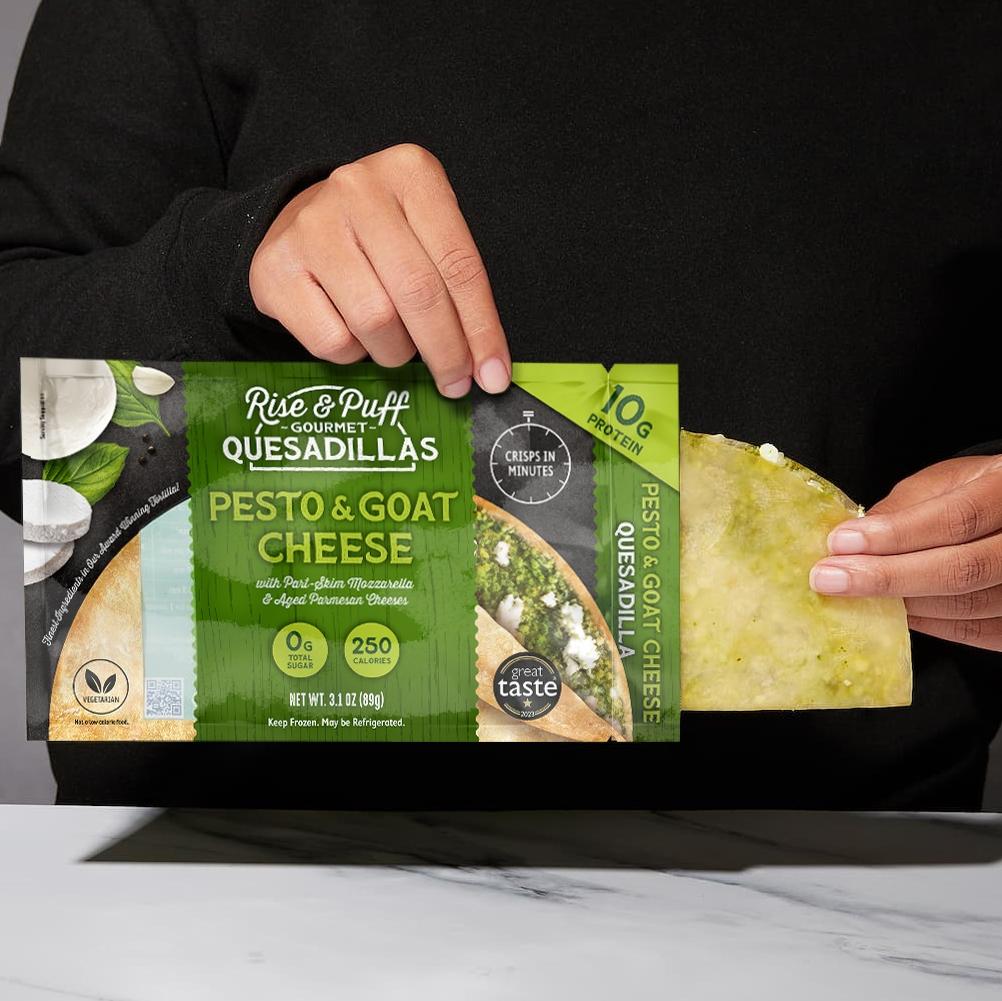 Pesto and goat cheese quesadilla being pulled out of packagin