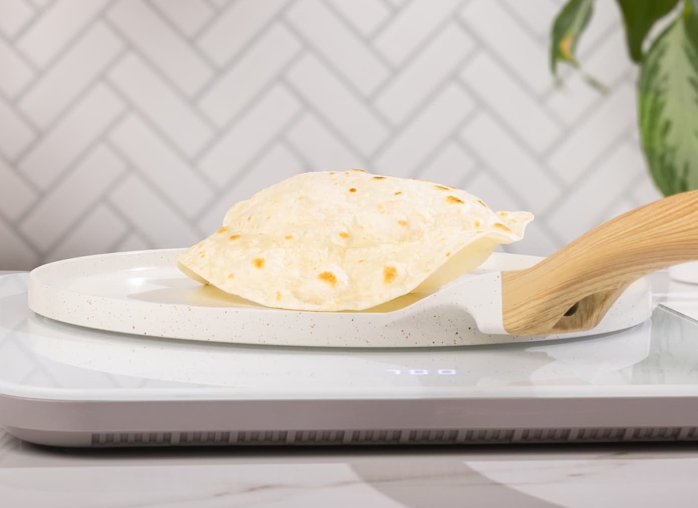 Rise & Puff Flour tortilla puffing on stove