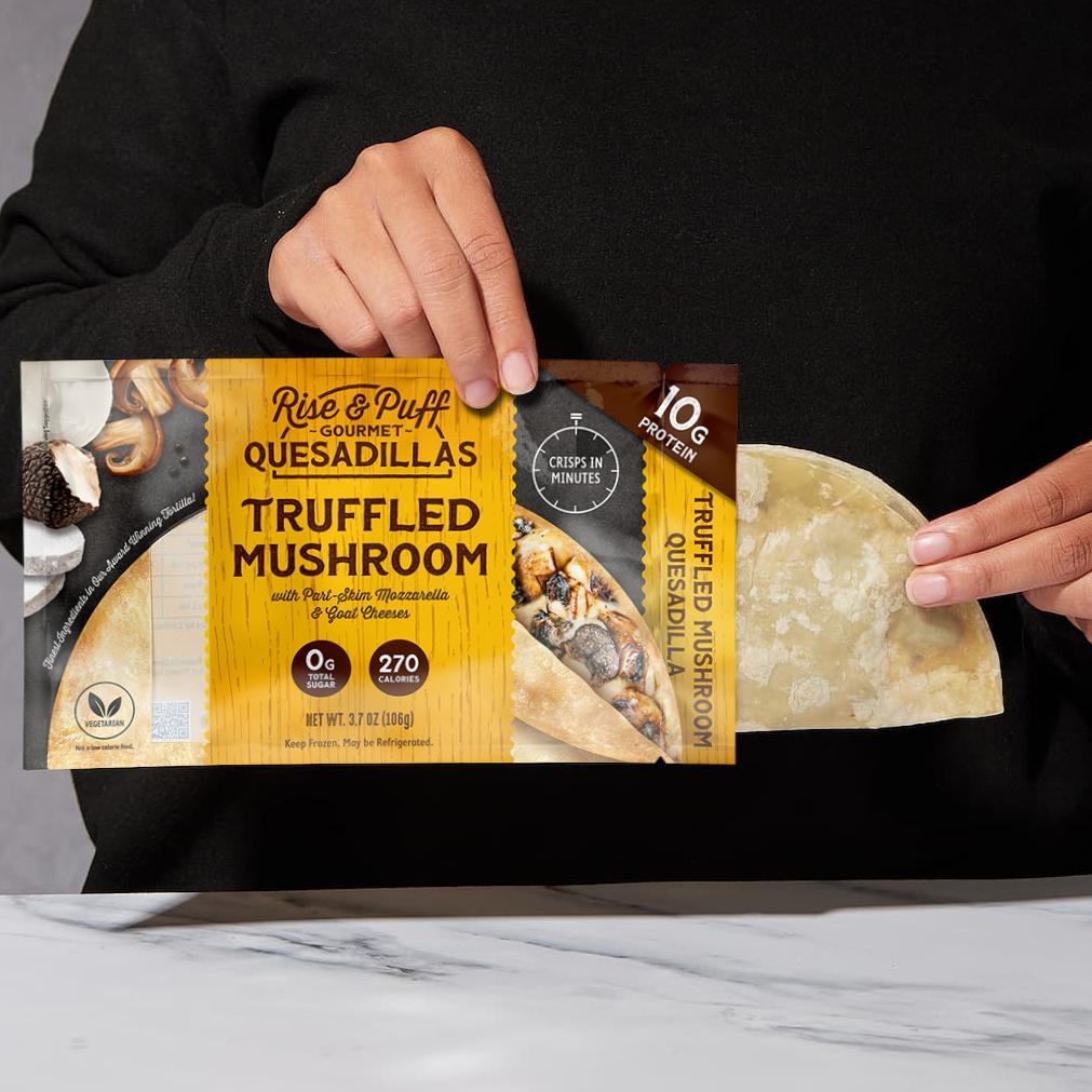 Truffled Mushroom & Cheese being pulled out of packaging