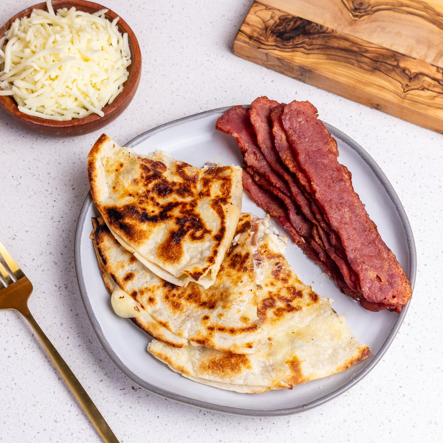 Turkey Sausage and Bacon cheese quesadilla on plate
