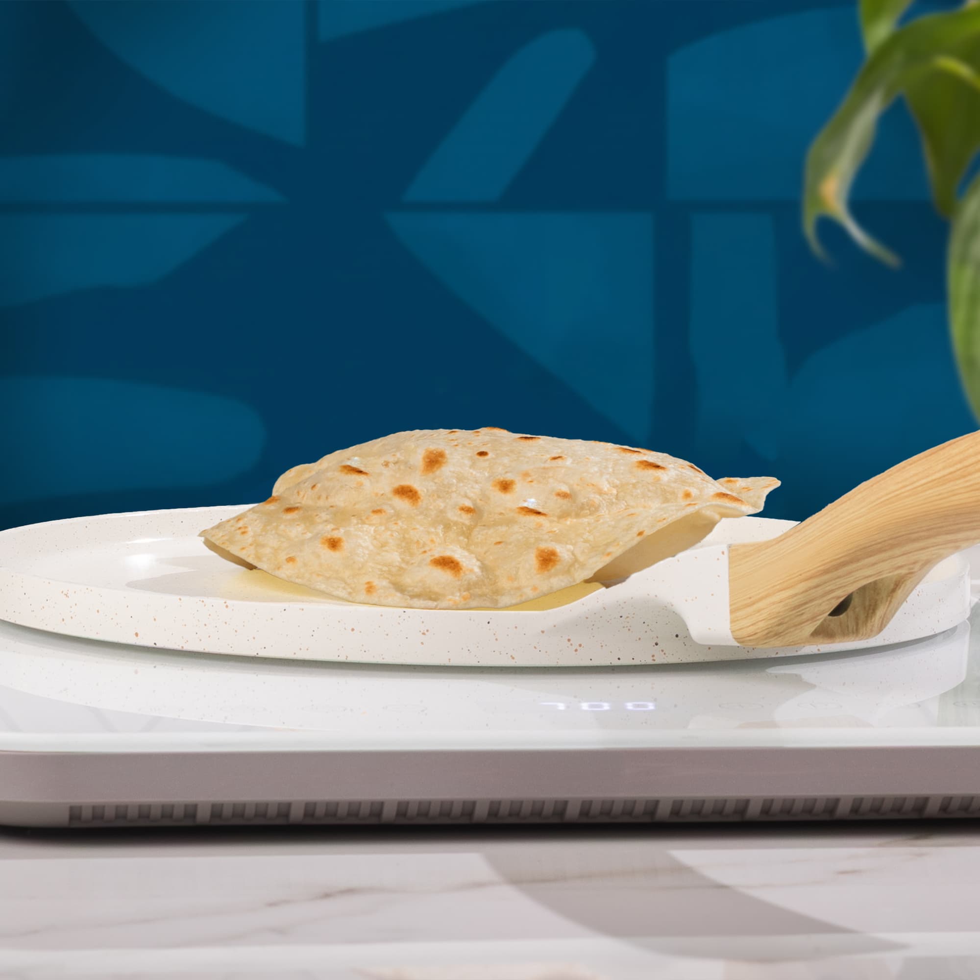 A Rise & Puff tortilla puffing up while being seared in a pan.