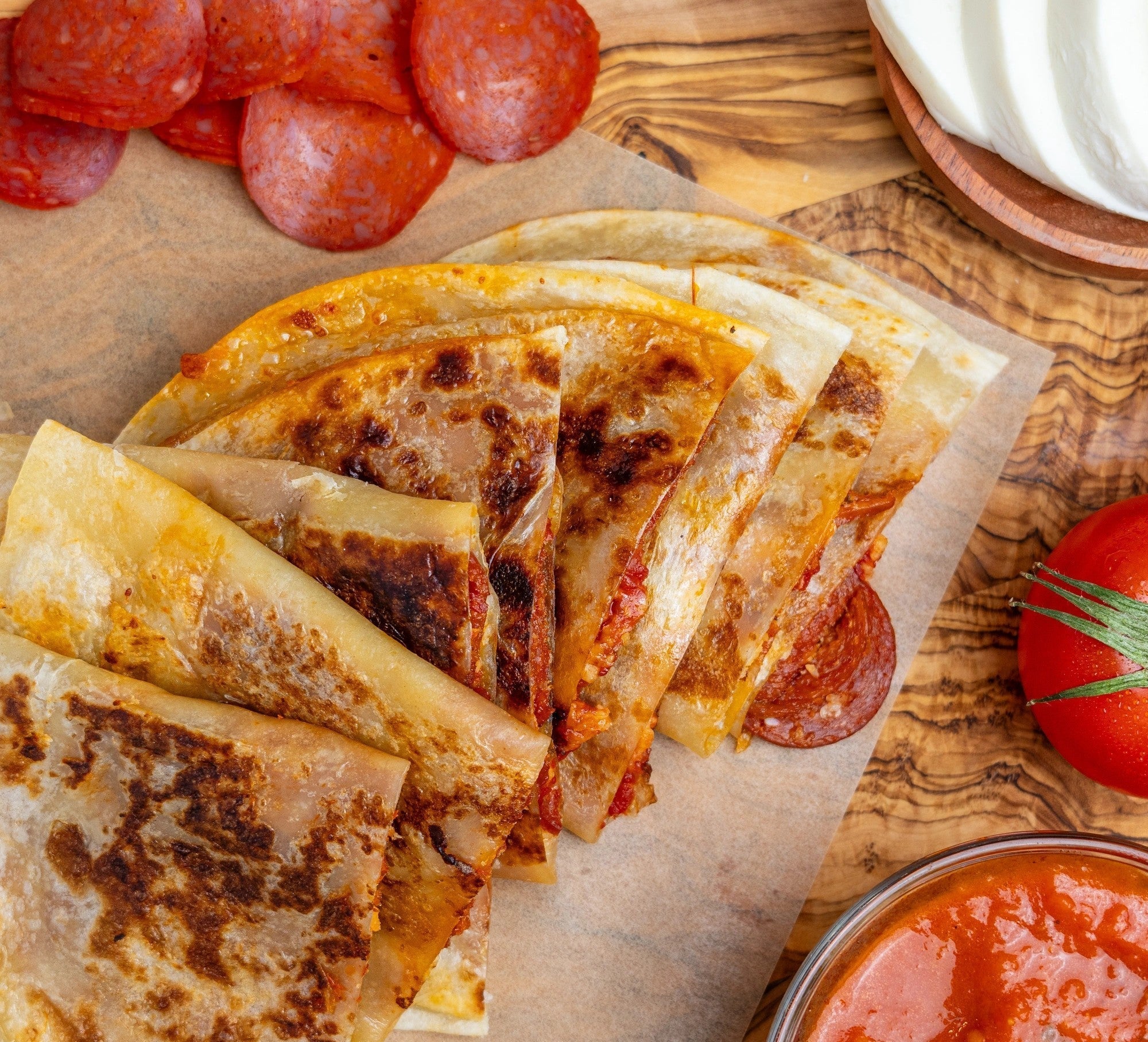 Rise & Puff tortilla topped with fresh veggies and cheese.