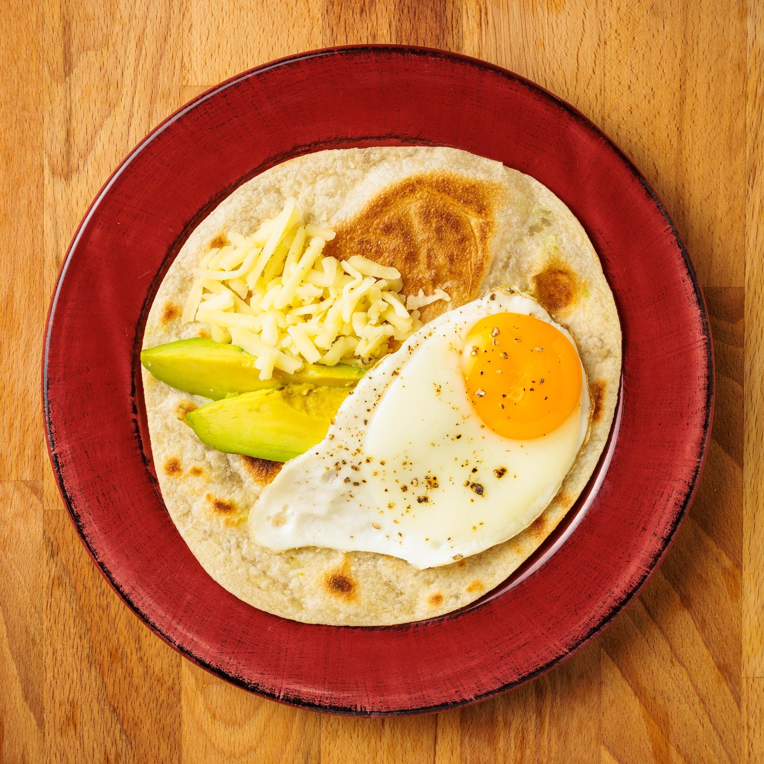 Fresh veggie wrap made with a Rise & Puff tortilla, filled with colorful vegetables for a low-sodium meal.