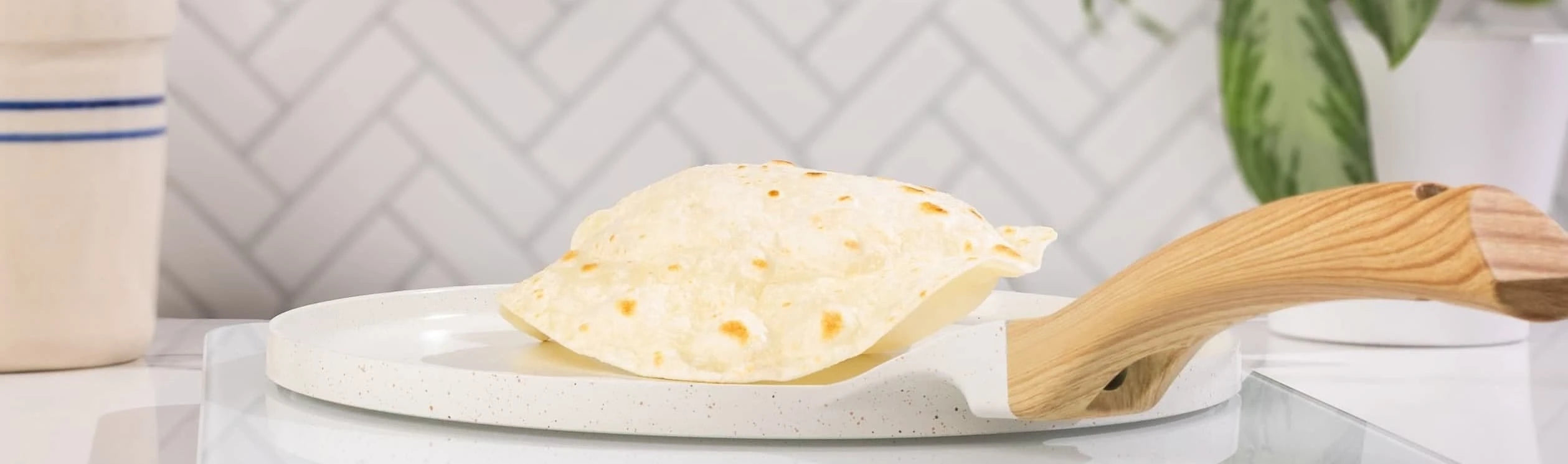 Tortilla on stove top puffing up