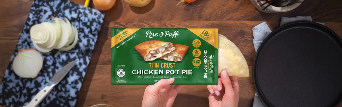 Rise & Puff healthier chicken pot pie being pulled out of packaging
