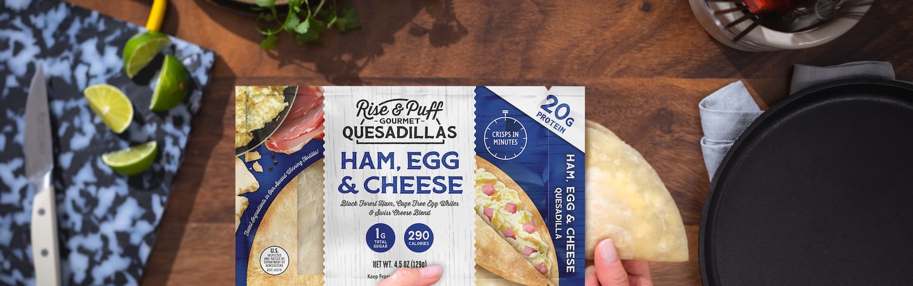 Ham Egg and Cheese quesadilla being pulled out of packaging