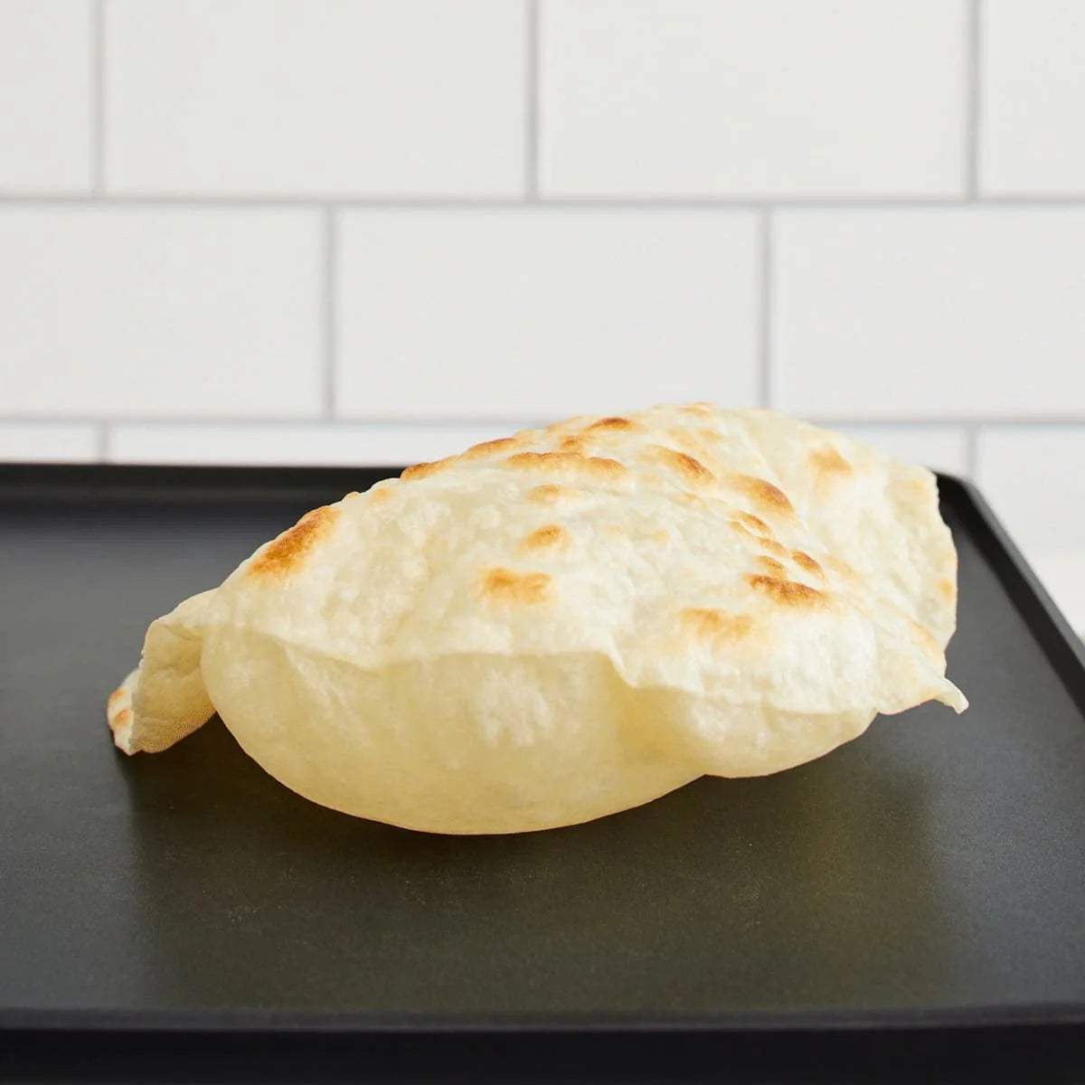 Fresh flour tortillas that puff when you cook them