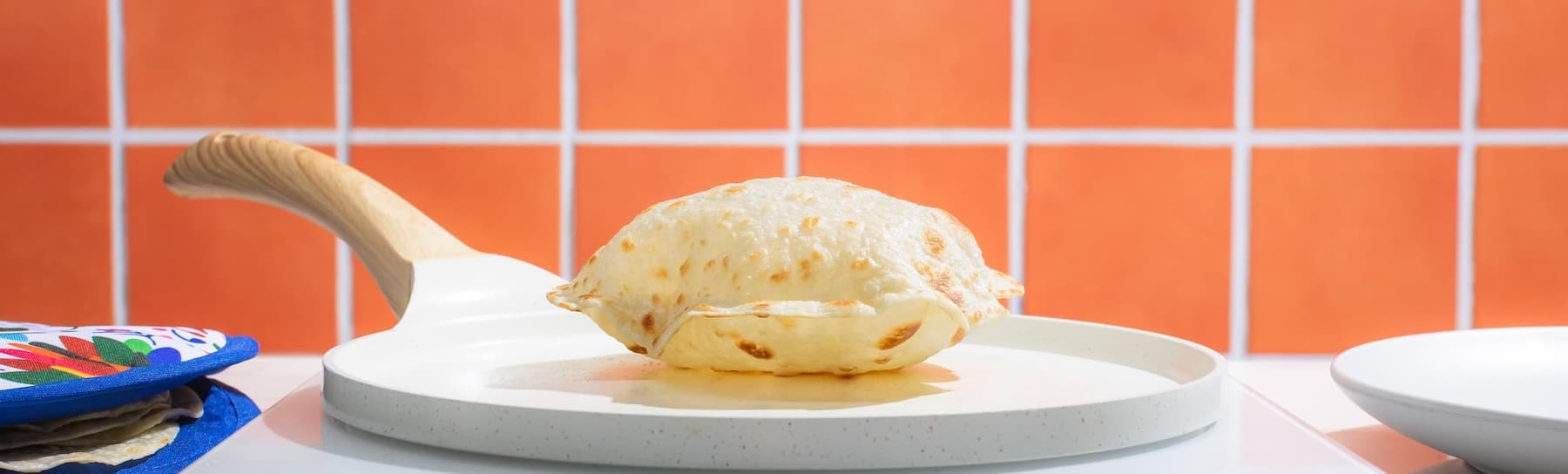 Rise & Puff tortilla puffing on a hot stove